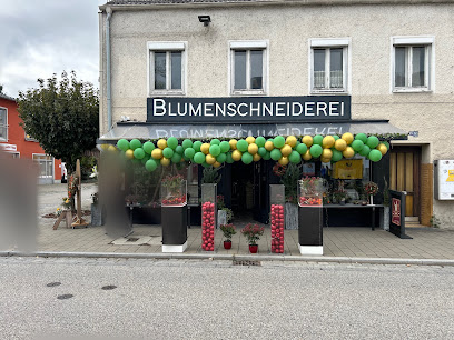 Blumenschneiderei